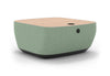 Byorne Connected Modular Coffee Table shown in dusty teal, dark grey and pebble grey finishes, featuring durable linen fabric upholstery, softly rounded edges and an injection moulded nylon leg for stability. Designed as part of a modular seating system, the table includes integrated USB ports and wireless charging to support modern work and lounge environments while maintaining a clean, contemporary aesthetic suitable for collaborative offices, reception areas and breakout spaces.
