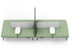 Omni Acoustic Bench System for open-plan offices and collaborative workspaces, featuring modular upholstered bench seating with a central acoustic privacy divider for noise reduction and focused work. This office breakout seating solution includes integrated side tables, built-in power outlets and a storage hook, creating a functional workspace for meetings, touchdown work and flexible office environments.