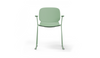 Aarhus Bistro Carver Stackable Chair by Quell Design – sculptural modern chair in morandi green moulded polypropylene shell with integrated armrests and sleek electrostatic powder-coated steel frame. The ergonomic, contoured seat offers comfort while its stackable design makes it perfect for dynamic office, café or communal spaces.