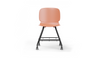 Aarhus Eiffel Chair V2 by Quell Design — a task/education chair in coral with a contoured moulded polypropylene seat, smooth-rolling four-wheel base and metal mesh storage under the seat. Designed for classrooms or offices, it offers ergonomic support, mobility and organised practicality for learning and working environments.