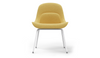Bloom ergonomic office chair by Quell Design — yellow upholstered contoured seat with linen-velvet and eco PU panels, mounted on slender black steel legs with subtle wraparound support structure. Elegant and sculptural, the chair adds refined comfort and modern design to contemporary interiors.
